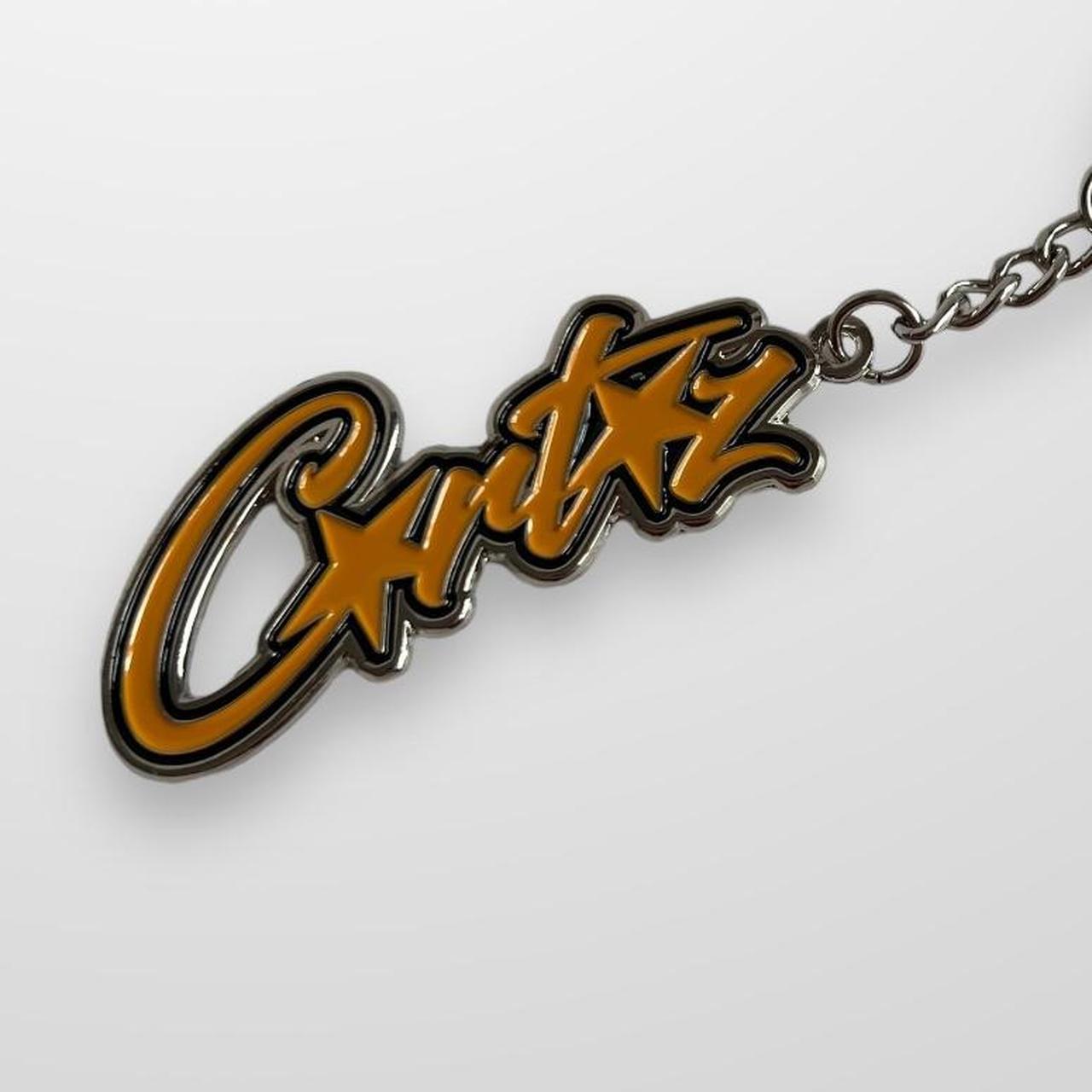 Corteiz Spellout Keyring In Black & Yellow