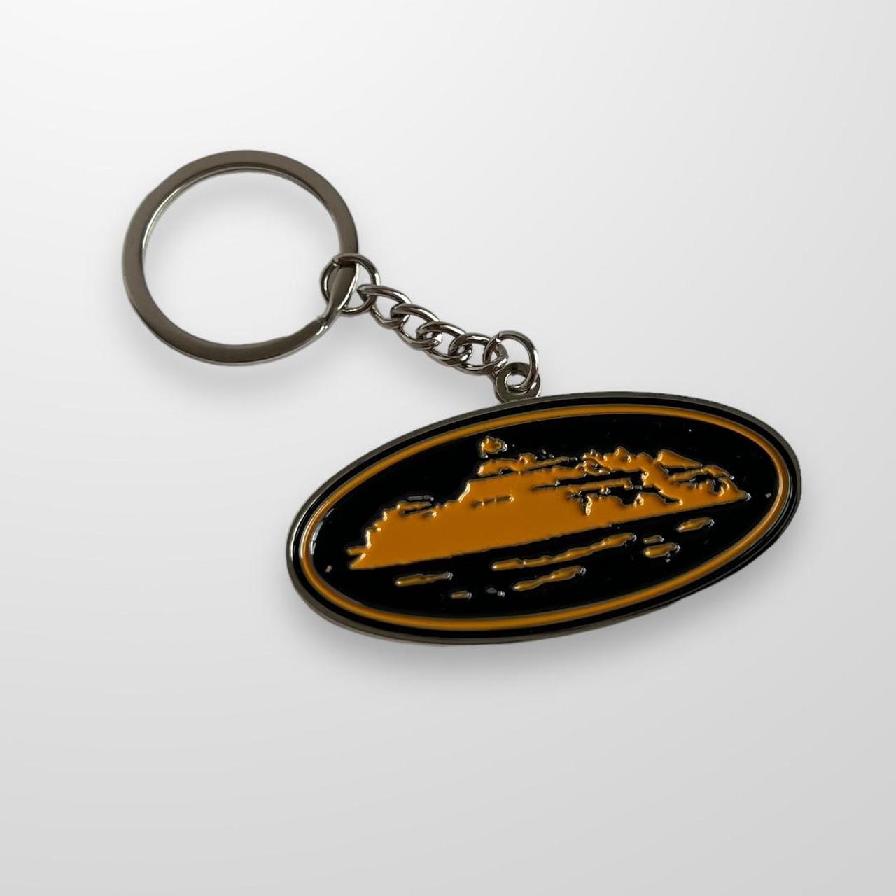 Corteiz Alcatraz Keyring In Black & Orange