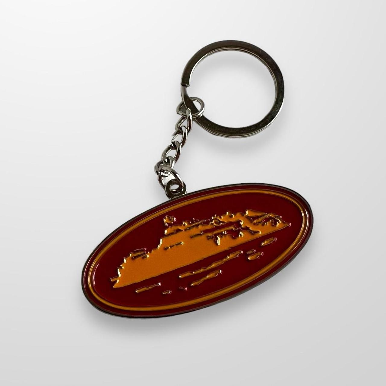 Corteiz Alcatraz Keyring In Red & Orange