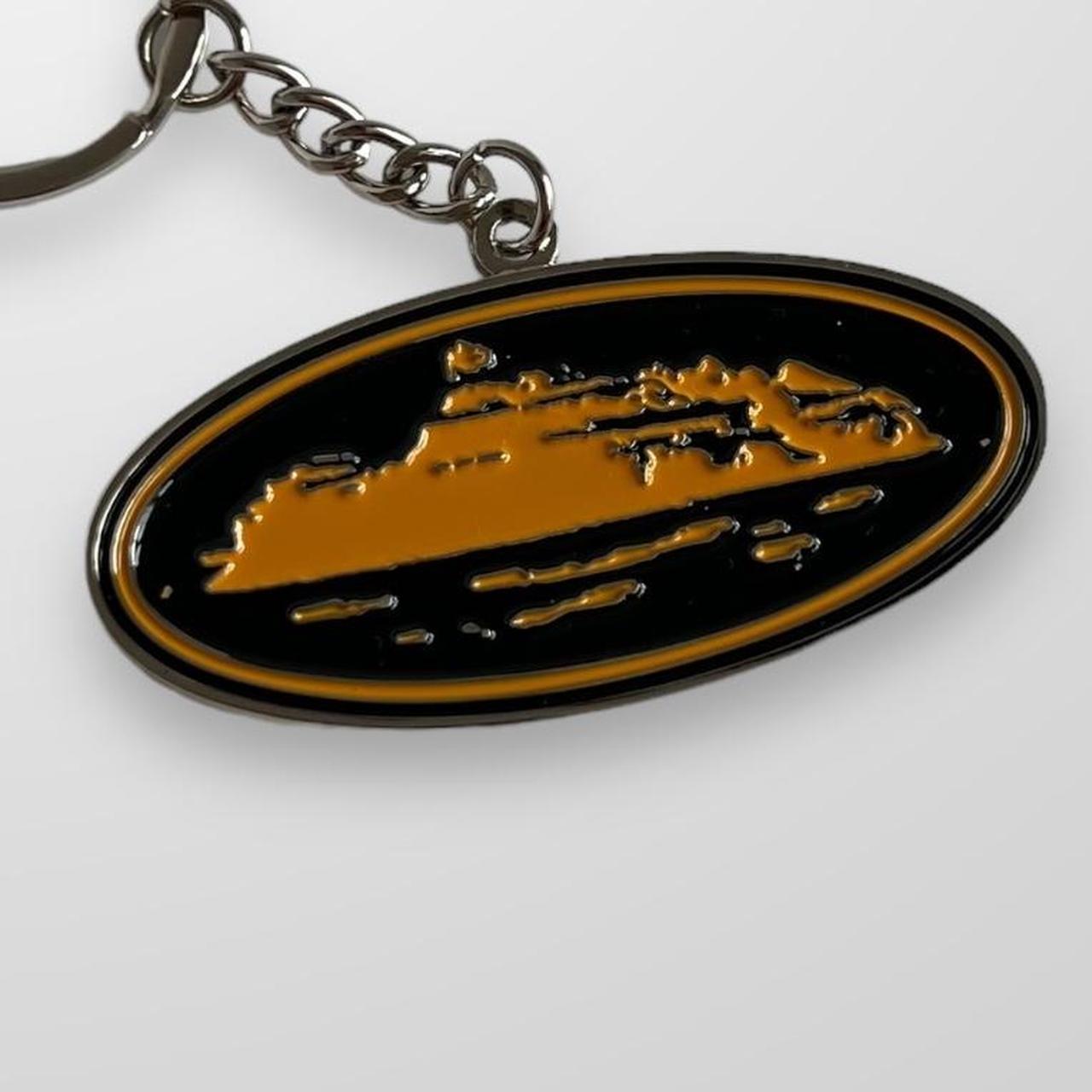 Corteiz Alcatraz Keyring In Black & Orange