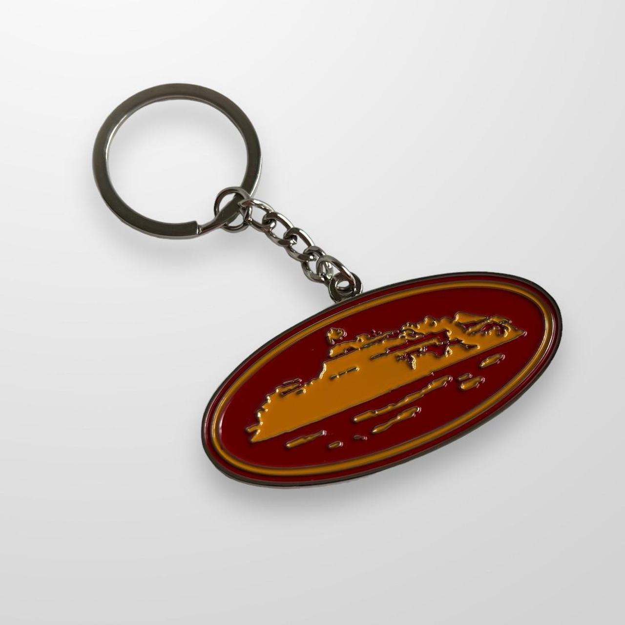 Corteiz Alcatraz Keyring In Red & Orange