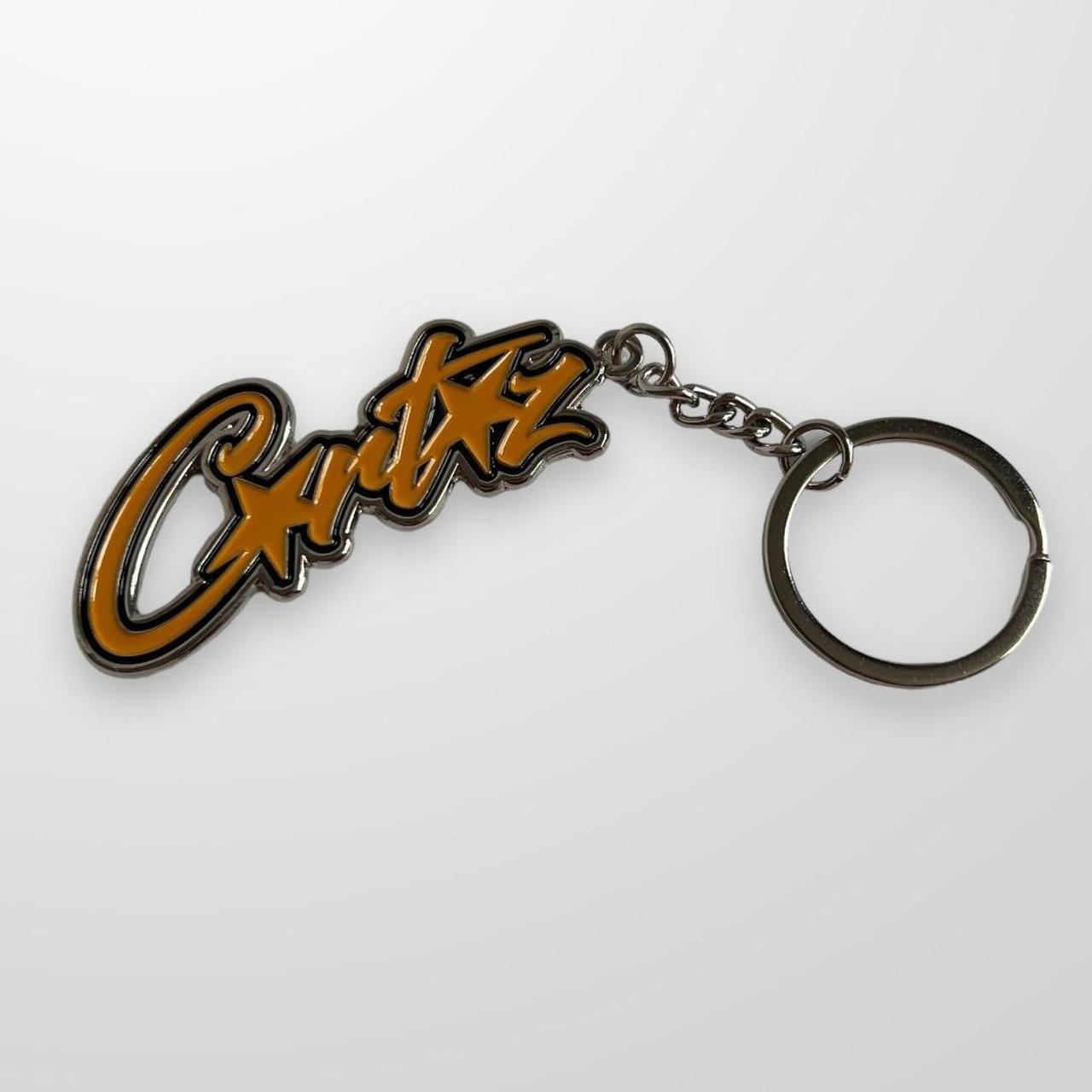 Corteiz Spellout Keyring In Black & Yellow