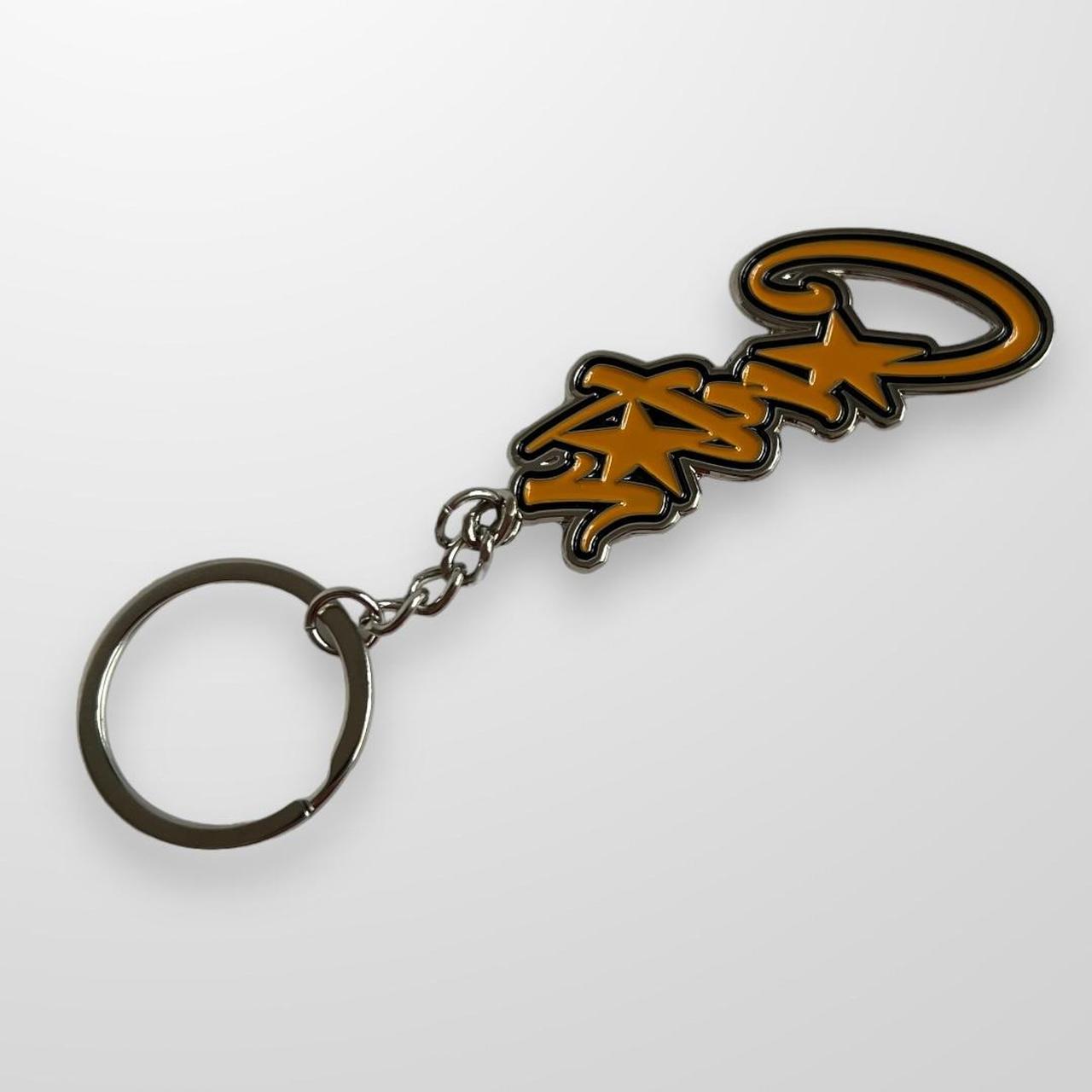 Corteiz Spellout Keyring In Black & Yellow