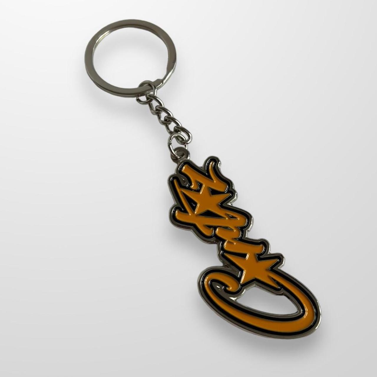 Corteiz Spellout Keyring In Black & Yellow